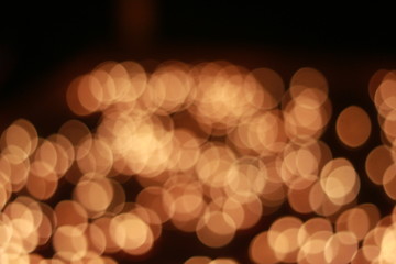 Wall Mural - Bokeh of the candle on the golden mounth