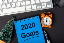 Goals 2020 - Message On Notebook. Targets, Goal, Dreams And New Year's Promises For The Next Year