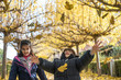 © FotoAndalucia - Siblings with autumn leafs ready for play in autumn day