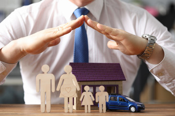 Businessman protecting home