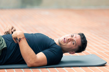 Young man exercising outdoors.