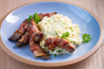 Wall Mural - Lamb liver wrapped in bacon with mash potato