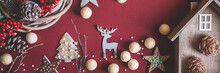 Creative Layout Banner Merry Christmas And New Year Holidays On Burgundy Paper Background Decorative House Of A Deer And Wreath Stars.