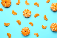 Sweet Tangerines On Color Background