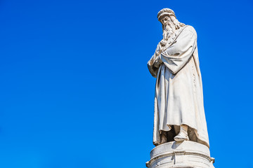 Statue of Leonardo da Vinci sculpted by Pietro Magni in Piazza della Scala, Milan, Italy