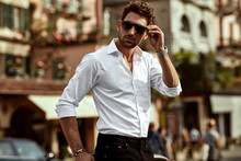 Stylish Man Wearing Sunglasses And White Shirt