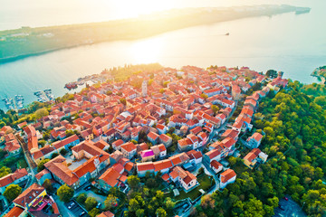 Wall Mural - Town of Omisalj on Krk island aerial epic sunset view