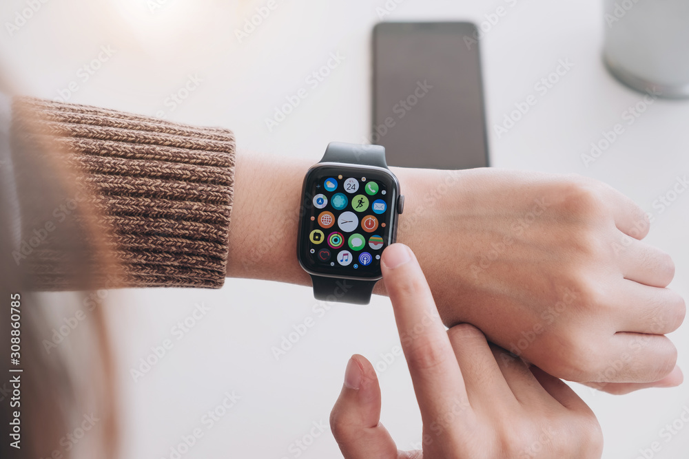 CHIANG MAI, THAILAND -FEB 24, 2019 : close up image of the new apple watch sport on women wrist, Chiang Mai, Thailand on Febuary 24, 2019 .