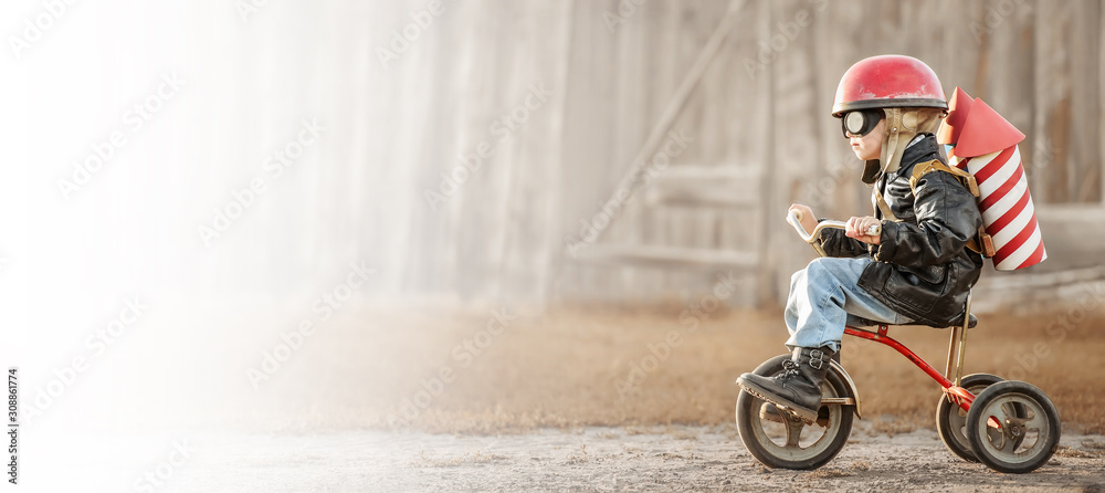 Boy play in the rider and the rocketman - obrazy, fototapety, plakaty 