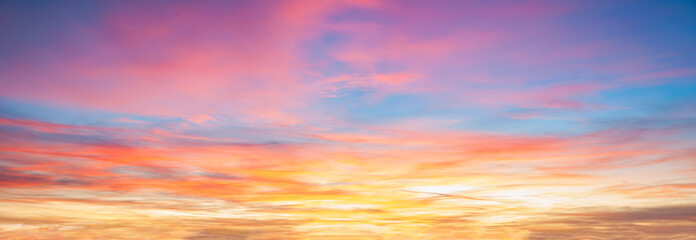 Wall Mural - Colorful cloudy sky at sunset background