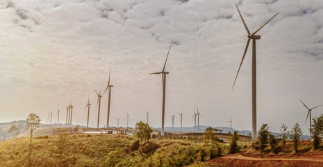 Wall Mural - wind turbine on hill. concept clean energy in nature