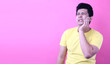 © Justinboat29 - Young  Asia man with a toothache on pink background in studio With copy space.