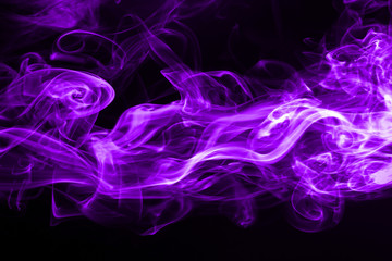 Wall Mural - Purple smoke abstract on black background for design. ink water color