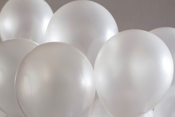 Wall Mural - white balloons on grey beige background