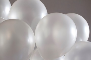 Wall Mural - white balloons on grey beige background