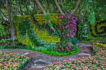 Poster - Vertical gardening harmonious with nature in the park.