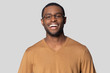 © fizkes - Happy smiling african american man in casual sweater portrait.