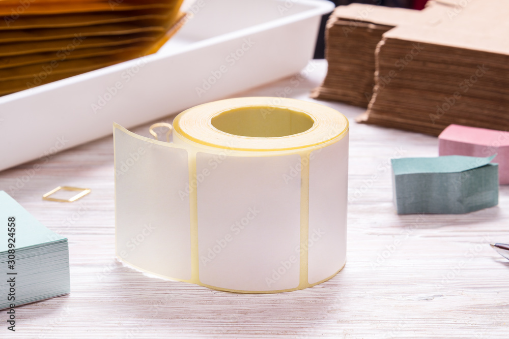 White  tape roll  on wooden office table