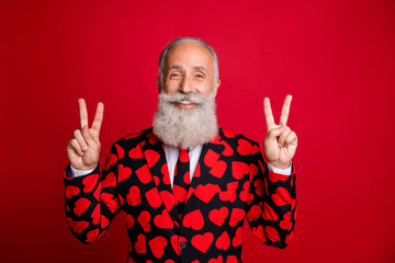 Sticker - Closeup photo of funky aged attractive man amour cupid role showing v-sign symbols greets party people wear hipster hearts pattern suit costume tie isolated red color background