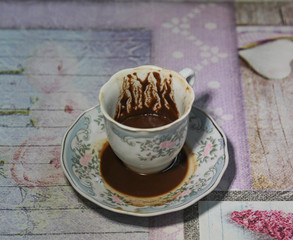 Wall Mural - traditional turkish coffee fortune, the shape of coffee grounds in the cup gives news from the future