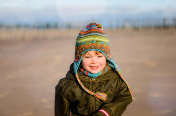 Poster - beautiful girl facing the cold in a good mood