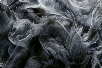 outer space abstract background, black matter. thunderstorm clouds in the sky. mystical swirling smo