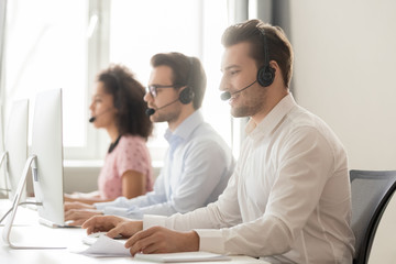Wall Mural - male call center agent talk consulting client online