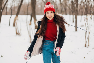 Poster - smiling woman having fun in winter park