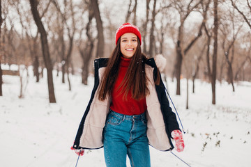 Poster - smiling woman having fun in winter park