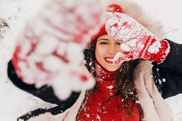 Poster - smiling woman having fun in winter park