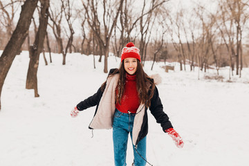 Poster - smiling woman having fun in winter park