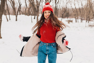 Poster - smiling woman having fun in winter park