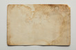 © LIGHTFIELD STUDIOS - top view of vintage dirty beige paper on grey background