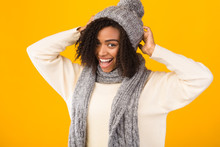 Cheerful African American Girl Wearing Hat And Scarf