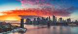 Fototapeta Nowy Jork - Panoramic view on Brooklyn bridge and Manhattan at vibrant sunset, New York City