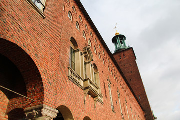 old tower of the castle with vintage red bricks and beautiful arches