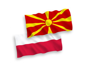 Flags of North Macedonia and Poland on a white background