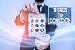 © Zofia - Text sign showing Things To Consider. Business photo text think about something carefully in order to make decision
