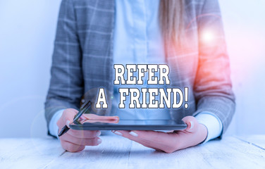 Poster - Conceptual hand writing showing Refer A Friend. Concept meaning direct someone to another or send him something like gift Business woman sitting with mobile phone on the table