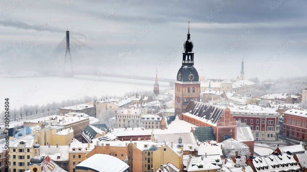 Obraz na płótnie Areal view on Riga cityscape in fog, Latvia w salonie