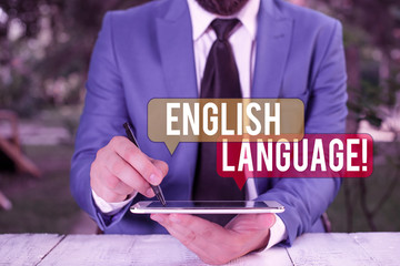 Poster - Text sign showing English Language. Business photo text third spoken native lang in world after Chinese and Spanish Businessman pointing with pen in empty copy space
