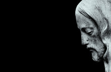 Profil Of Jesus Christ Isolated On Black Background. (ancient Statue)
