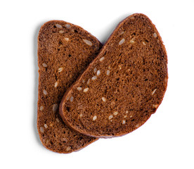 Wall Mural - A piece of bread with seeds on white background isolation, top view