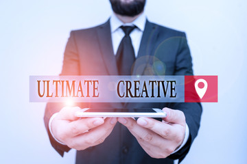Leinwandbilder - Conceptual hand writing showing Ultimate Creative. Concept meaning way of producing or using original and unusual ideas Male human wear formal work suit hold smartphone using hand