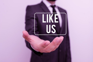 Fototapete - Writing note showing Like Us. Business concept for Asking to follow on social media Feel attraction or pleasure Male human with beard wear formal working suit clothes hand