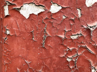 Old wall background - city building decay texture. Urban decline pattern with peeling paint.