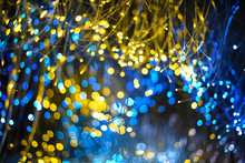 Abstract Blur Gold Sparkle Bokeh Background. Dark Background Festive Christmas Background. Celebration Party