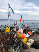 Fishing Buoys, Poles, Ropes And Equipment. Seaside.