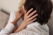 © LIGHTFIELD STUDIOS - Selective focus of young couple embracing at home