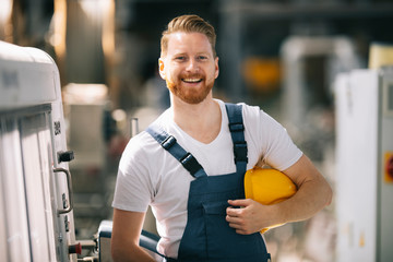 Wall Mural - Portrait of worker in factory.